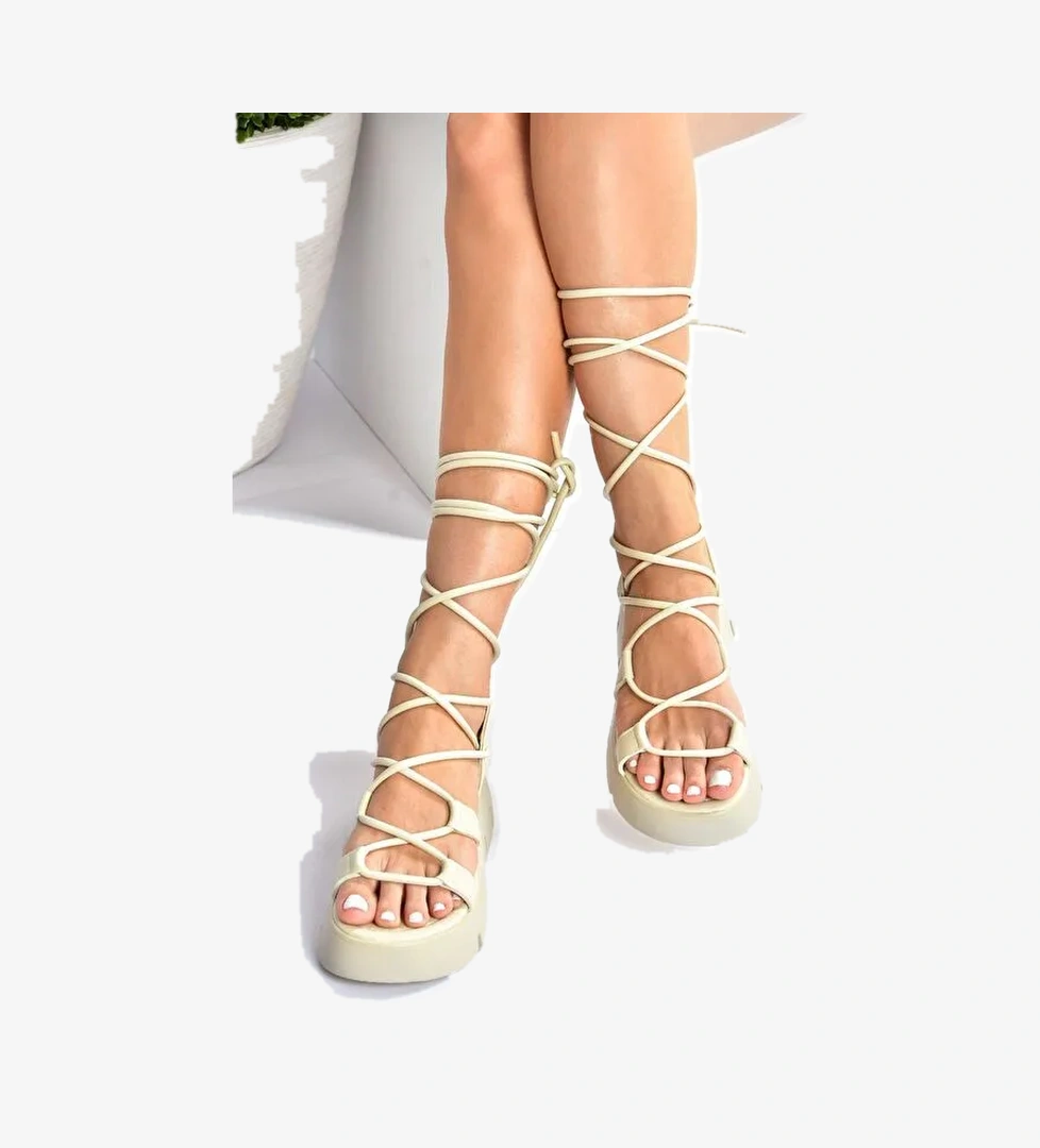 Bej Kalın Tabanlı Bilekten Bağlamalı Kadın Sandalet M267083009