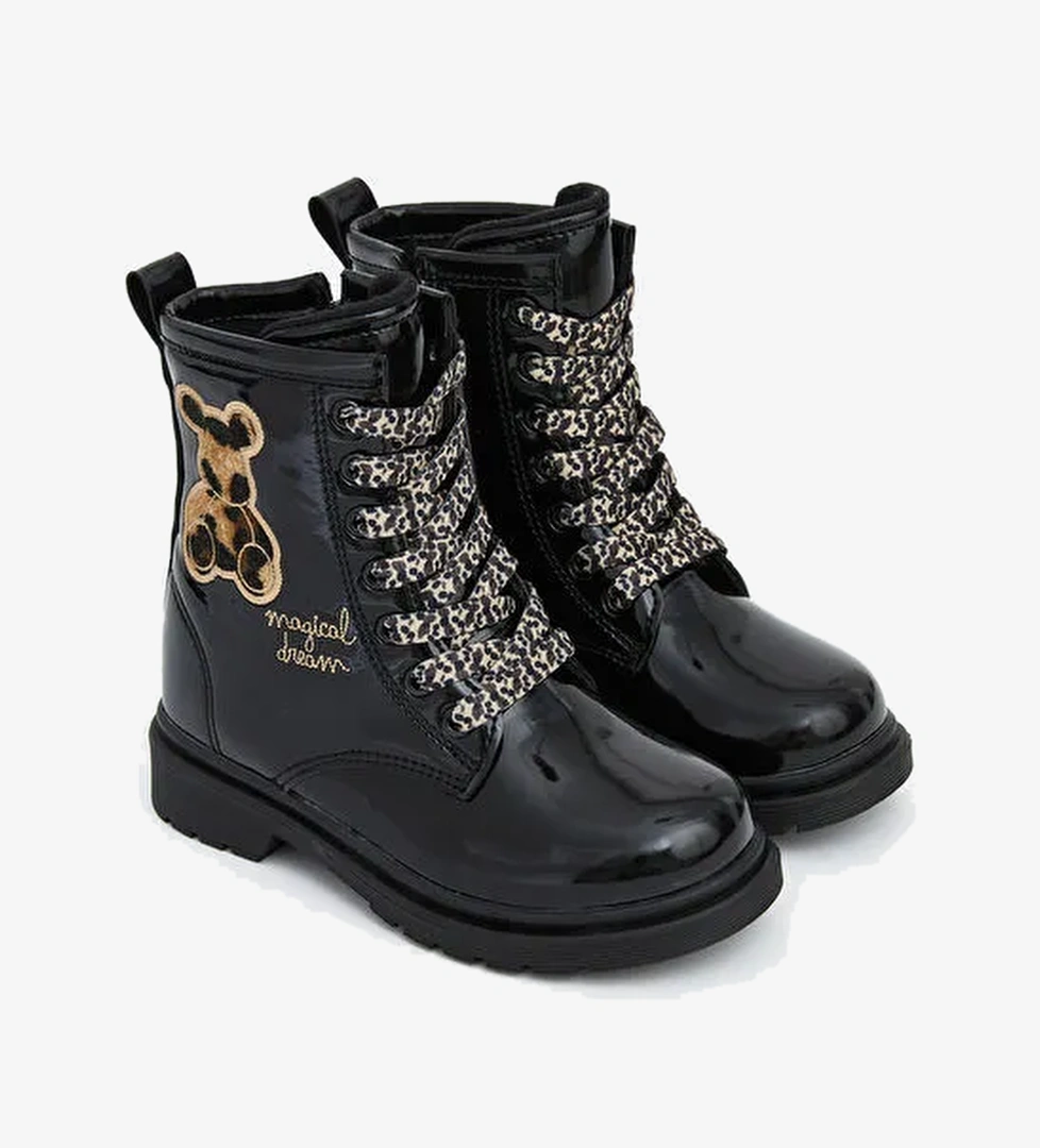 Deri Görünümlü Kız Bebek Bot - Görsel 1